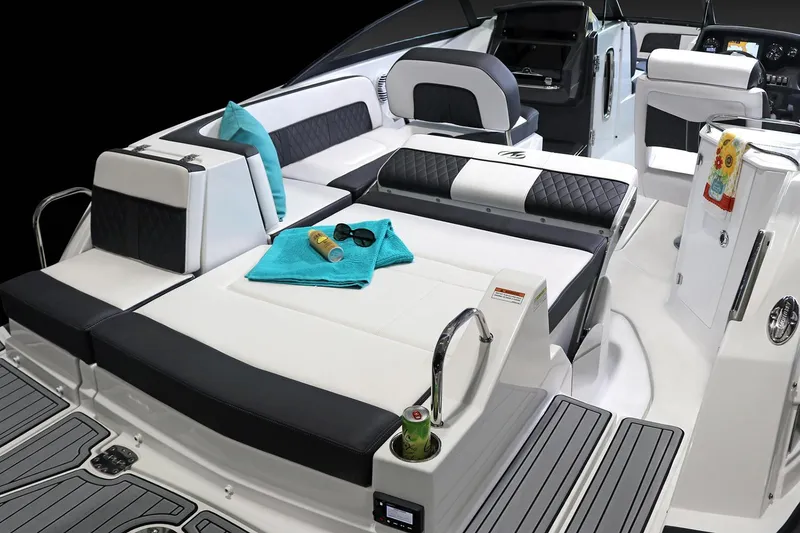 Slide: The Image of 2026 Monterey M-45 boat with Mercury outboard engine in showroom. - 5