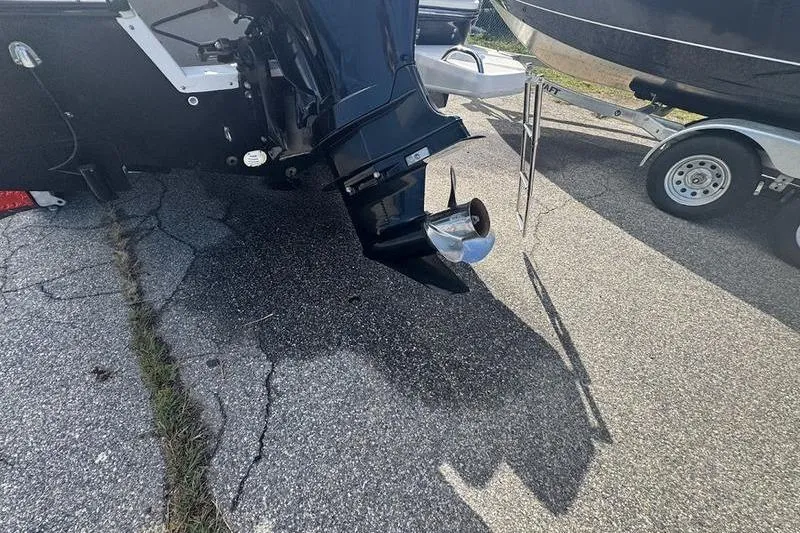 Slide: The Image of 2018 Bayliner Element F21 boat engine and propeller on a trailer. - 5
