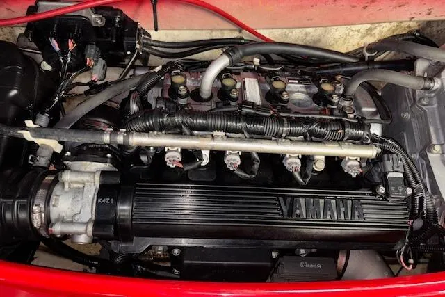 Slide: The Image of 2005 Yamaha WaveRunner VX 110 engine, detailed view of components and wiring. - 14