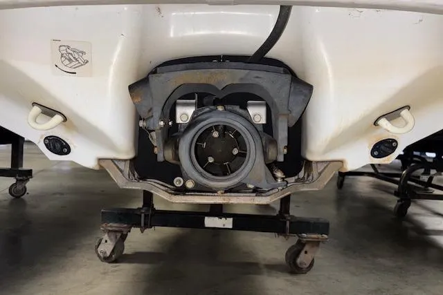 Slide: The Image of 2005 Yamaha WaveRunner VX 110 jet propulsion system on display in a garage. - 15