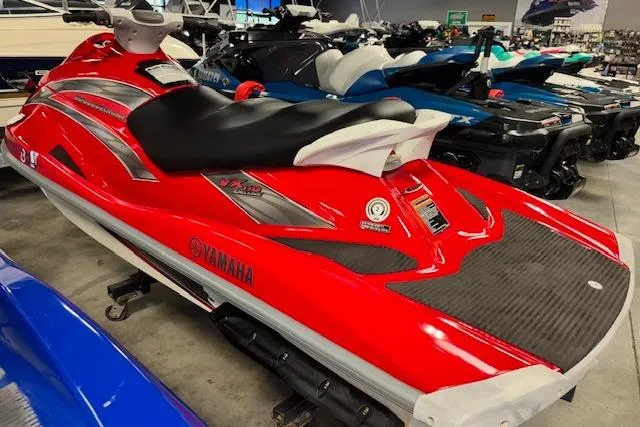 Slide: The Image of 2005 Yamaha WaveRunner VX 110 in vibrant red, displayed in a showroom. - 5
