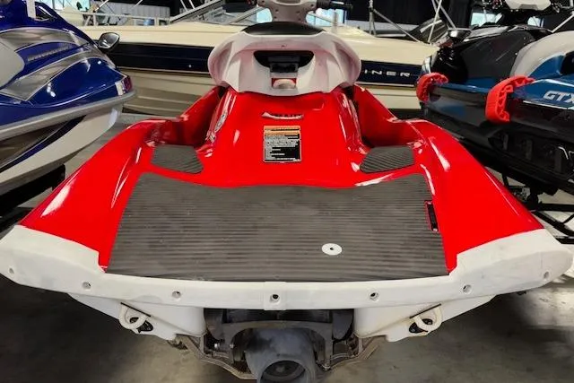 Slide: The Image of 2005 Yamaha WaveRunner VX 110 in red, rear view, displayed indoors. - 6