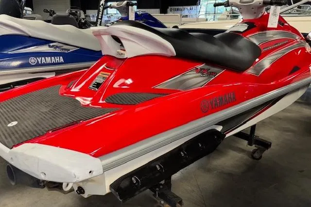 Slide: The Image of 2005 Yamaha WaveRunner VX 110 in vibrant red, displayed indoors. - 9