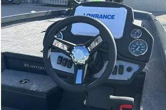 Slide: The Image of 2025 Ranger RT198P Fishing Package dashboard with steering wheel and Lowrance display. - 7