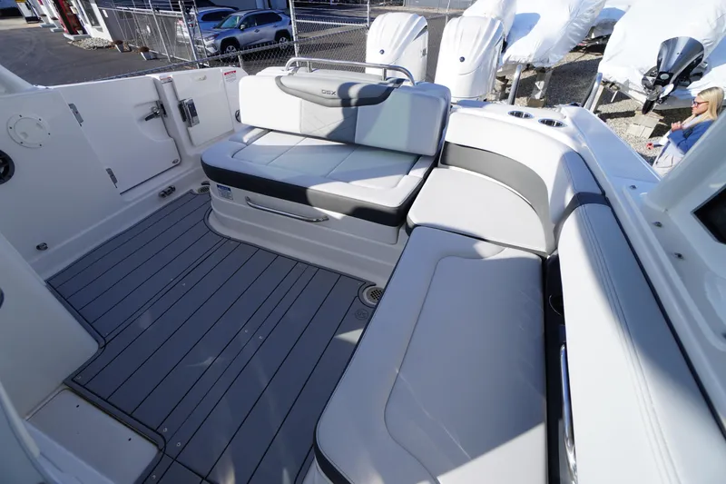 Slide: The Image of 2026 Chaparral 280 OSX boat interior with sleek seating and modern design. - 37