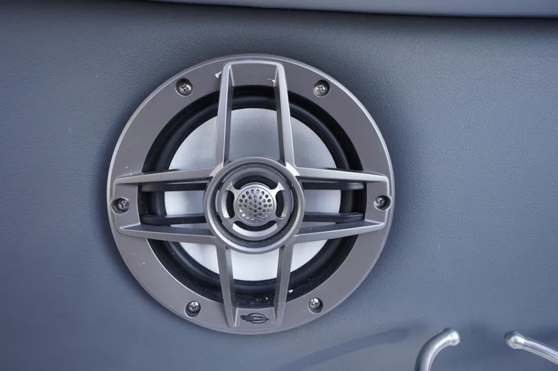 Slide: The Image of Speaker detail on 2026 Chaparral 280 OSX boat, featuring sleek metallic design. - 49