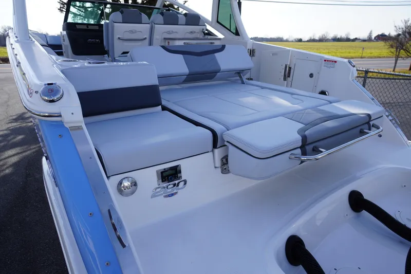 Slide: The Image of 2026 Chaparral 280 OSX boat with luxurious seating and modern design. - 55