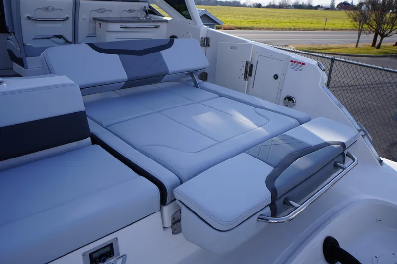 Slide: The Image of 2026 Chaparral 280 OSX boat interior with luxurious seating and modern design. - 57