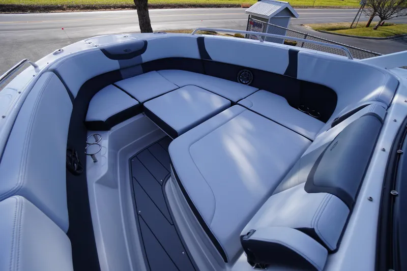 Slide: The Image of 2026 Chaparral 280 OSX boat interior with spacious seating and modern design. - 6