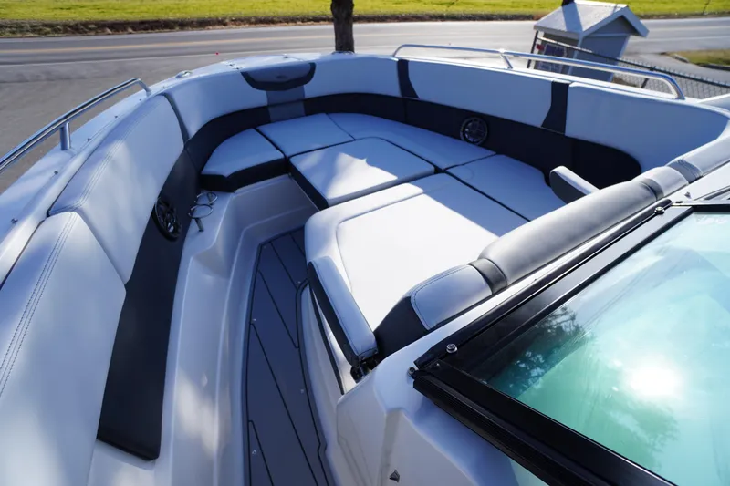 Slide: The Image of 2026 Chaparral 280 OSX boat interior with spacious seating and modern design. - 7