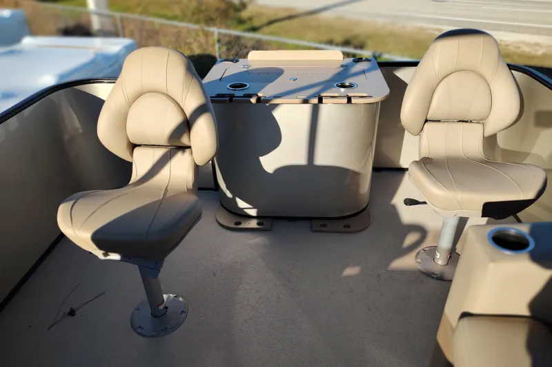 Slide: The Image of Interior of 2026 Sylvan Mirage 820 PARTY FISH with beige seating and table. - 11