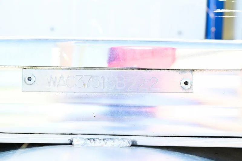 Slide: The Image of 2023 Aloha Pontoon metal plate with serial number WAC37615B222. - 15