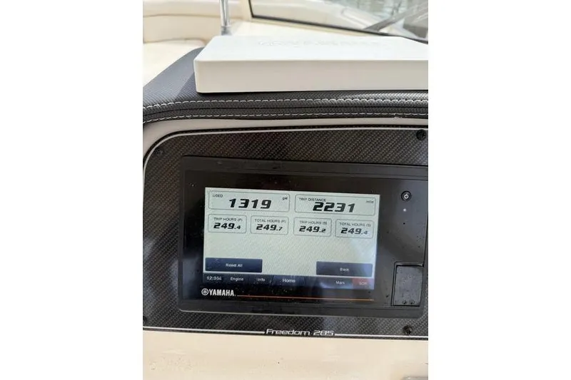 Slide: The Image of Dashboard of 2019 Grady-White Freedom 285 boat with Yamaha display. - 11