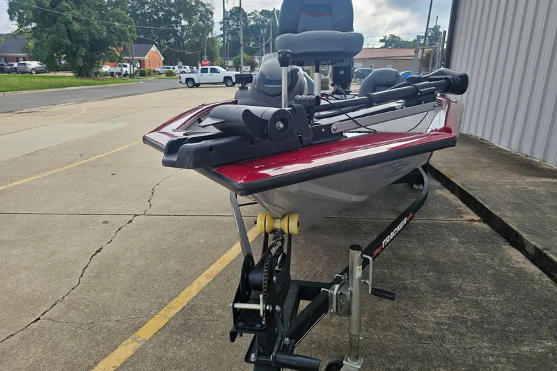 Slide: The Image of 2021 Tracker Pro Team 175 TXW boat on trailer, parked outdoors. - 3