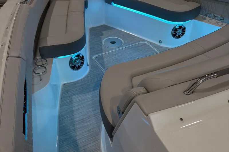 Slide: The Image of Luxurious interior of 2025 Searay 400 SLX boat with plush seating and modern controls. - 10