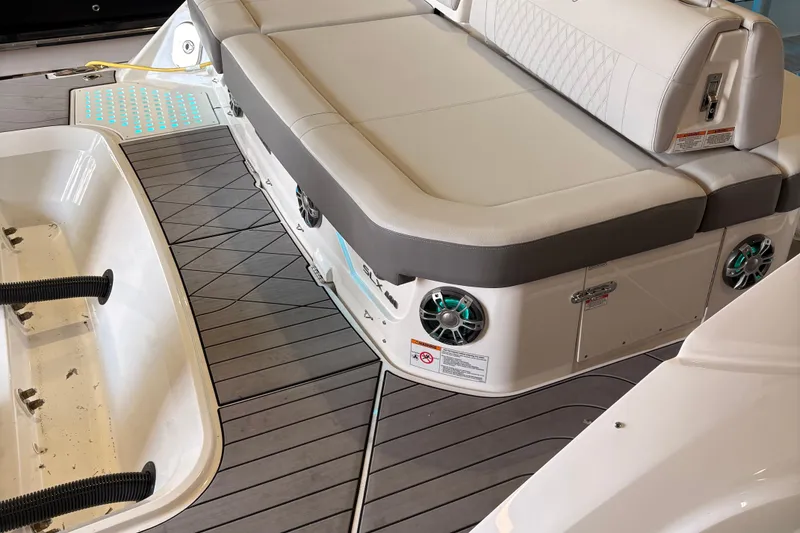 Slide: The Image of Luxurious interior of 2025 Searay 400 SLX boat with modern seating and ambient lighting. - 2