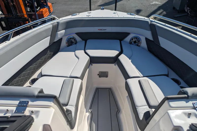 Slide: The Image of 2026 Chaparral 6 GTS boat interior with luxurious seating and modern design. - 12