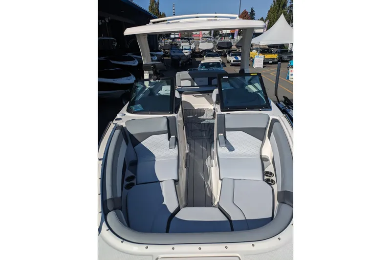 Slide: The Image of 2026 Chaparral 6 GTS boat interior with modern seating and sleek design. - 14