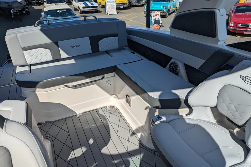 Slide: The Image of 2026 Chaparral 6 GTS boat interior with luxurious seating and modern design. - 18