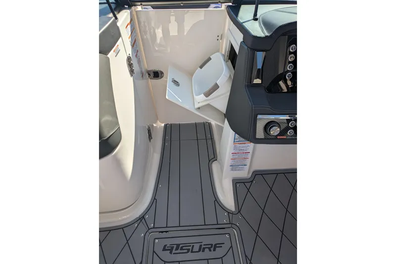 Slide: The Image of 2026 Chaparral 6 GTS boat interior with sleek design and modern controls. - 26