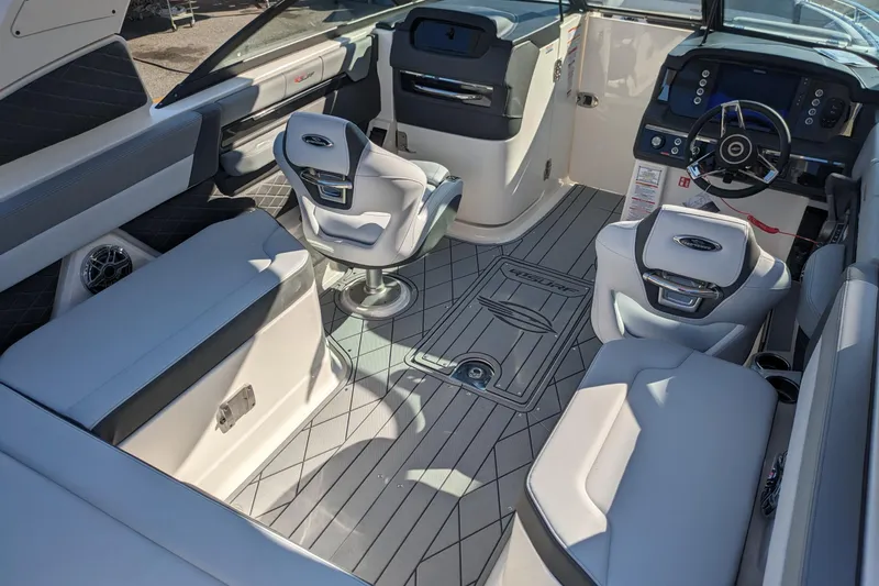 Slide: The Image of Luxurious interior of 2026 Chaparral 6 GTS boat with modern seating and dashboard. - 30