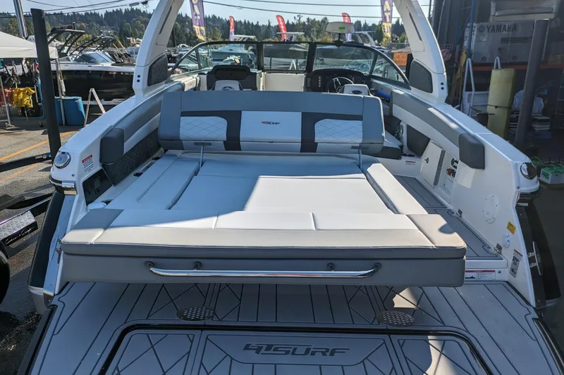 Slide: The Image of 2026 Chaparral 6 GTS boat interior with spacious seating and modern design. - 33