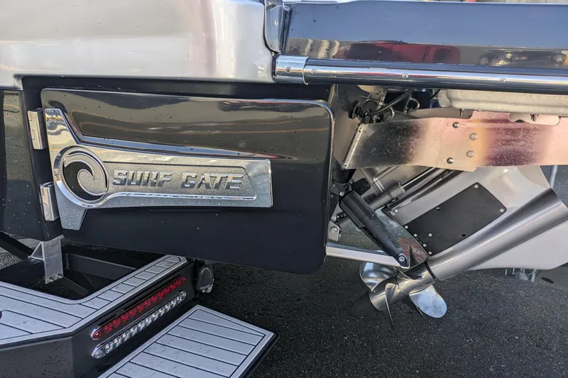 Slide: The Image of 2026 Chaparral 6 GTS boat with Surf Gate technology, featuring sleek design and advanced propulsion system. - 38