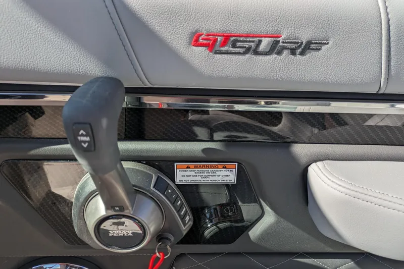 Slide: The Image of 2026 Chaparral 6 GTS interior with GT Surf logo and control lever. - 8