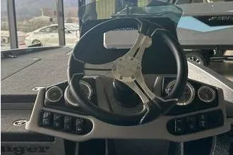 Slide: The Image of 2025 Ranger Z185 boat dashboard with steering wheel and control panel. - 5