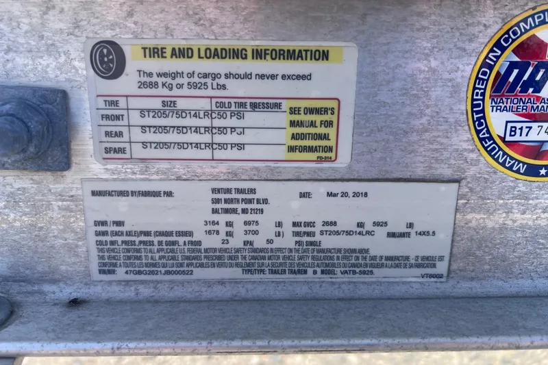 Slide: The Image of Tire and loading information label on a 2007 Sea Hunt Triton 240 trailer. - 16