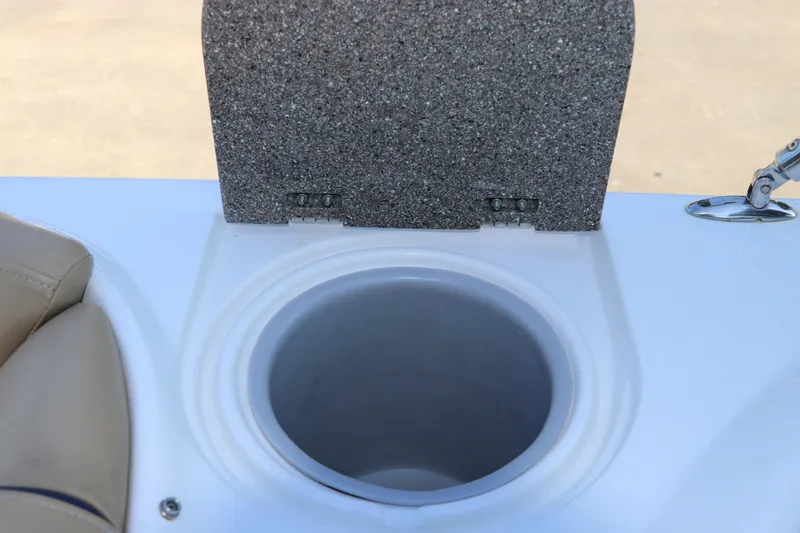 Slide: The Image of 2019 Hurricane SunDeck 2486 OB boat cup holder with textured cover. - 60