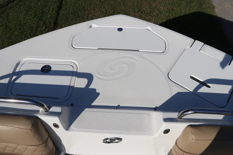 Slide: The Image of 2019 Hurricane SunDeck 2486 OB boat deck with storage compartments and seating. - 73