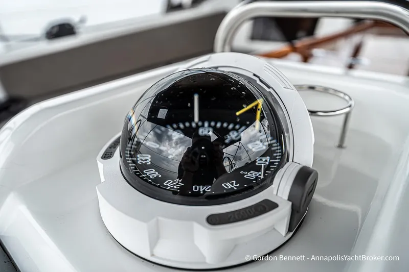 Slide: The Image of Compass on Jeanneau Sun Odyssey 410 yacht, 2022 model, with reflective surface and detailed markings. - 19