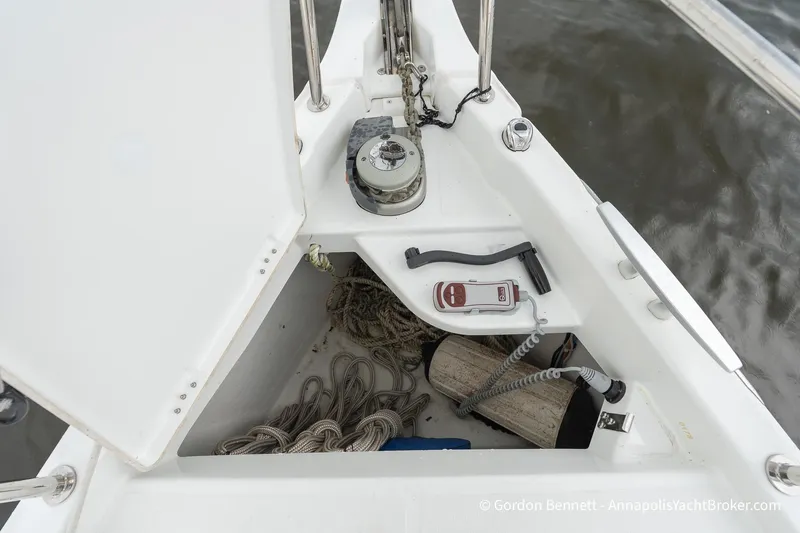Slide: The Image of Anchor locker of 2022 Jeanneau Sun Odyssey 410 with ropes and equipment. - 21