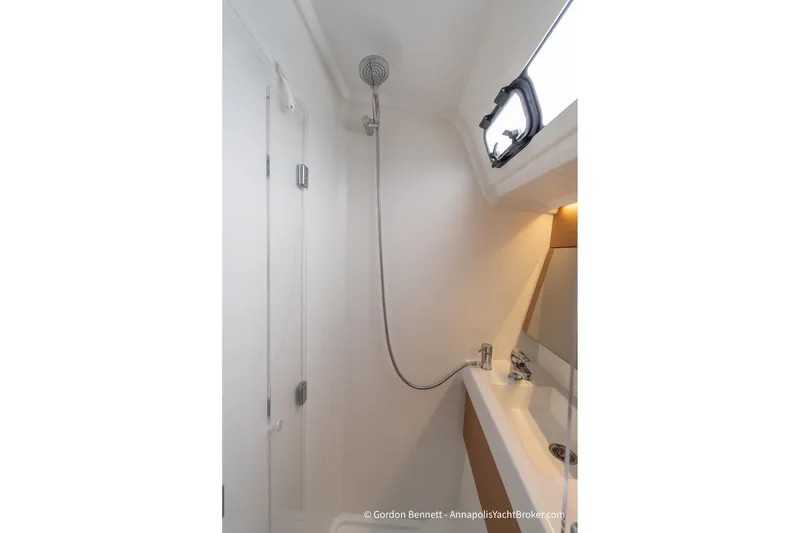 Slide: The Image of Shower area in 2022 Jeanneau Sun Odyssey 410 yacht, featuring modern fixtures and sleek design. - 61