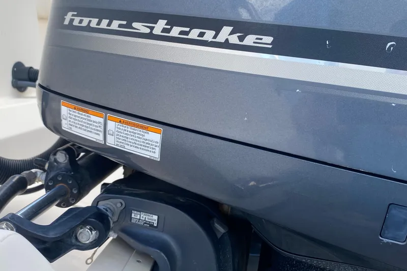 Slide: The Image of Four-stroke engine on 2018 Grady-White Canyon 306 boat, close-up view. - 18