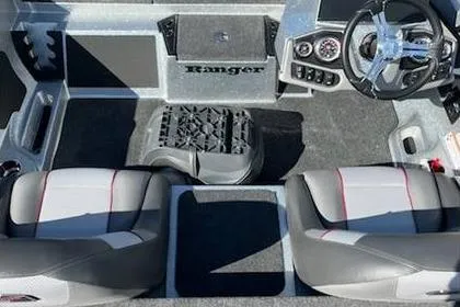 Slide: The Image of 2025 Ranger Z185 boat interior with dual seats and modern dashboard. - 6