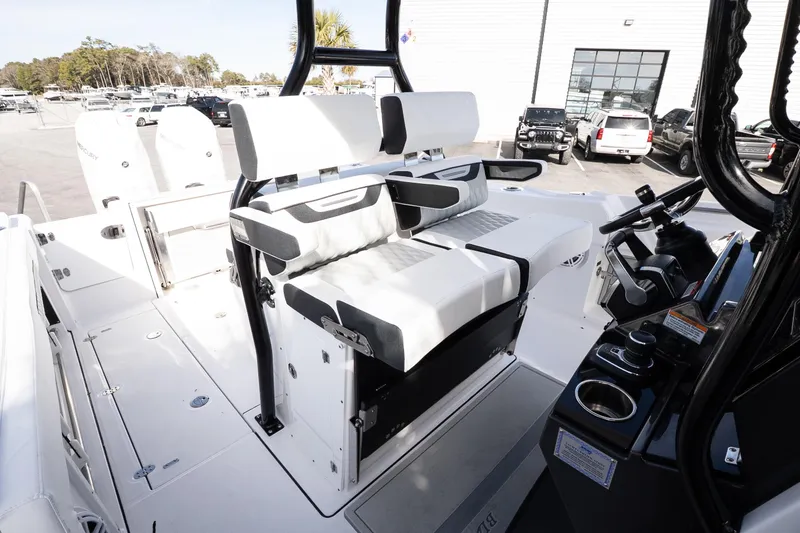 Slide: The Image of 2026 Blackfin 302 CC boat interior with modern seating and control console. - 18