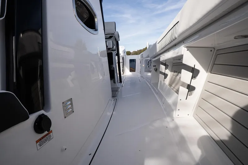 Slide: The Image of 2026 Blackfin 302 CC boat interior, showcasing sleek design and modern amenities. - 25
