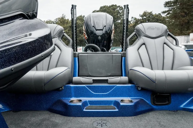 Slide: The Image of 2024 Skeeter ZXR20 boat interior with sleek gray seats and blue accents. - 15