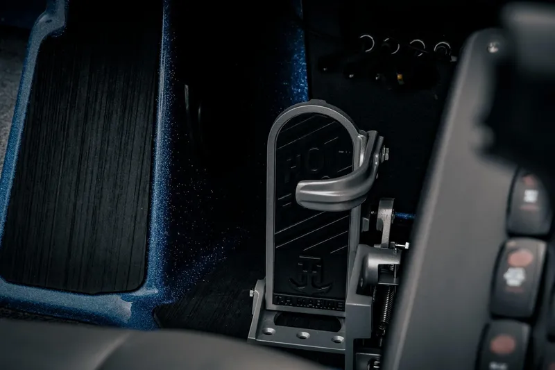 Slide: The Image of 2024 Skeeter ZXR20 boat foot pedal and control panel close-up. - 19