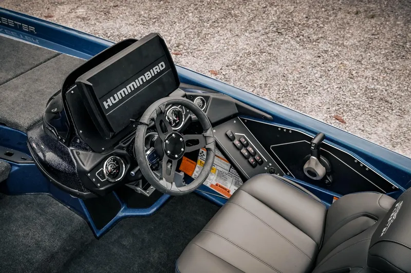 Slide: The Image of 2024 Skeeter ZXR20 boat cockpit with Humminbird electronics and modern steering controls. - 5