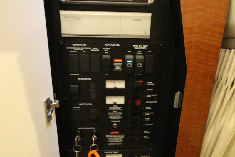 Slide: The Image of Electrical control panel on a 2005 Sea Ray 340 Sundancer boat. - 16