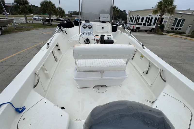 Slide: The Image of 2007 Hydra-Sports Lightning 180 CC boat interior with seating and console. - 11