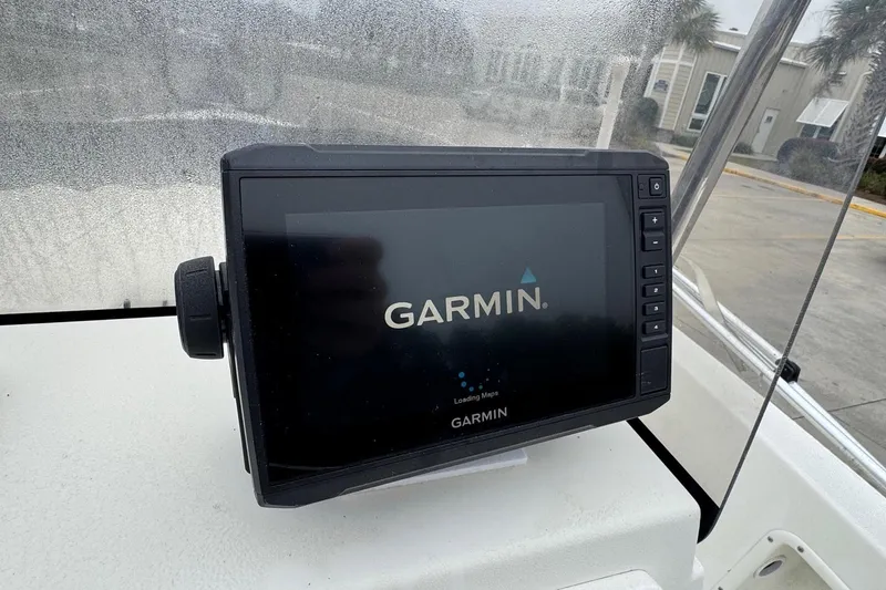 Slide: The Image of Garmin GPS device on 2007 Hydra-Sports Lightning 180 CC boat dashboard. - 16