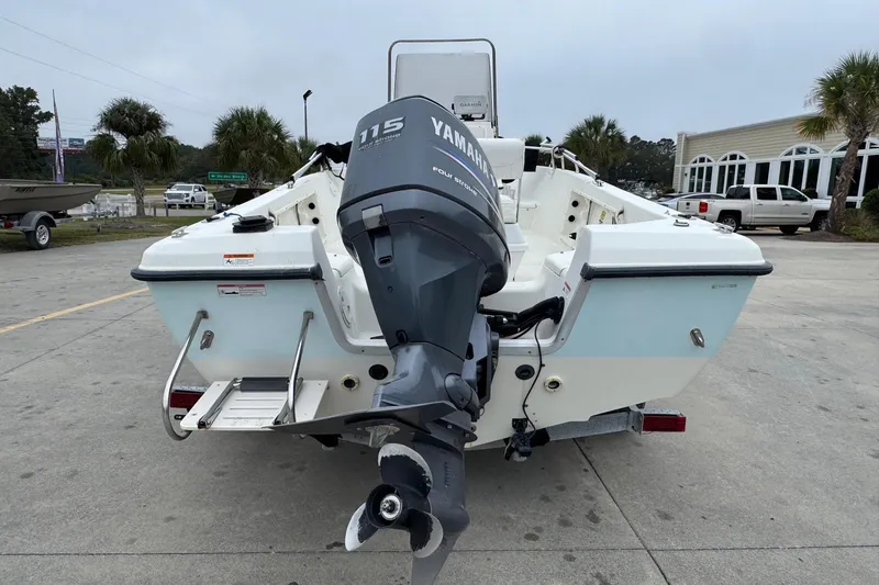 Slide: The Image of 2007 Hydra-Sports Lightning 180 CC boat with Yamaha 115 outboard motor, parked outdoors. - 4