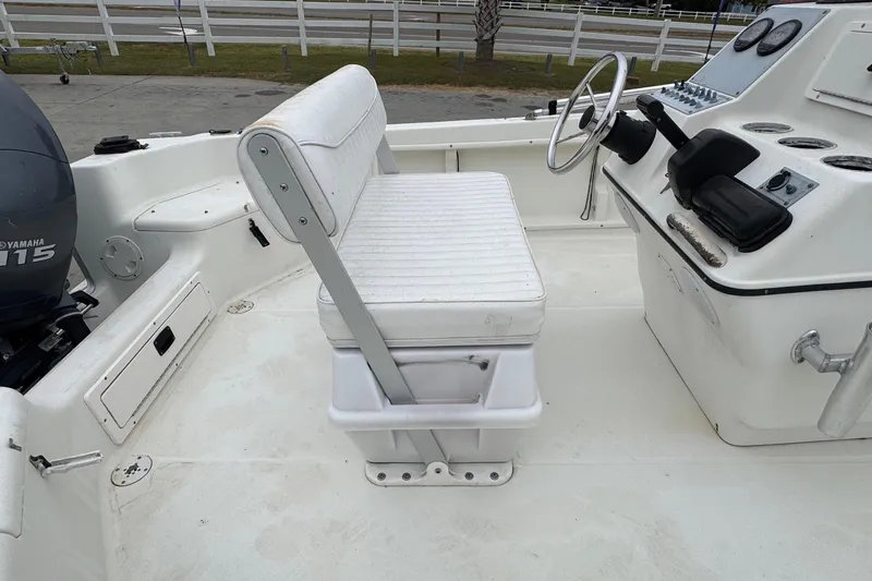Slide: The Image of 2007 Hydra-Sports Lightning 180 CC boat interior with steering console and seating. - 7