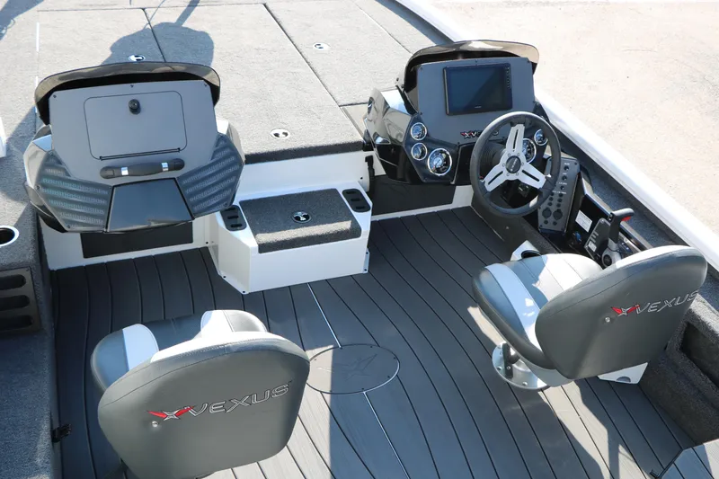 Slide: The Image of 2025 Vexus AVX 1985s boat interior with modern dashboard and seating. - 13