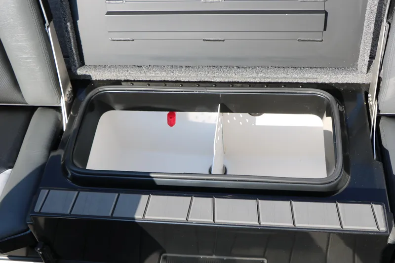 Slide: The Image of 2025 Vexus AVX 1985s boat storage compartment, open lid, interior view. - 30