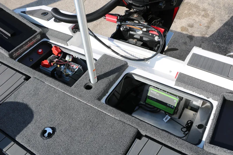 Slide: The Image of 2025 Vexus AVX 1985s boat interior showing battery compartments and equipment storage. - 31